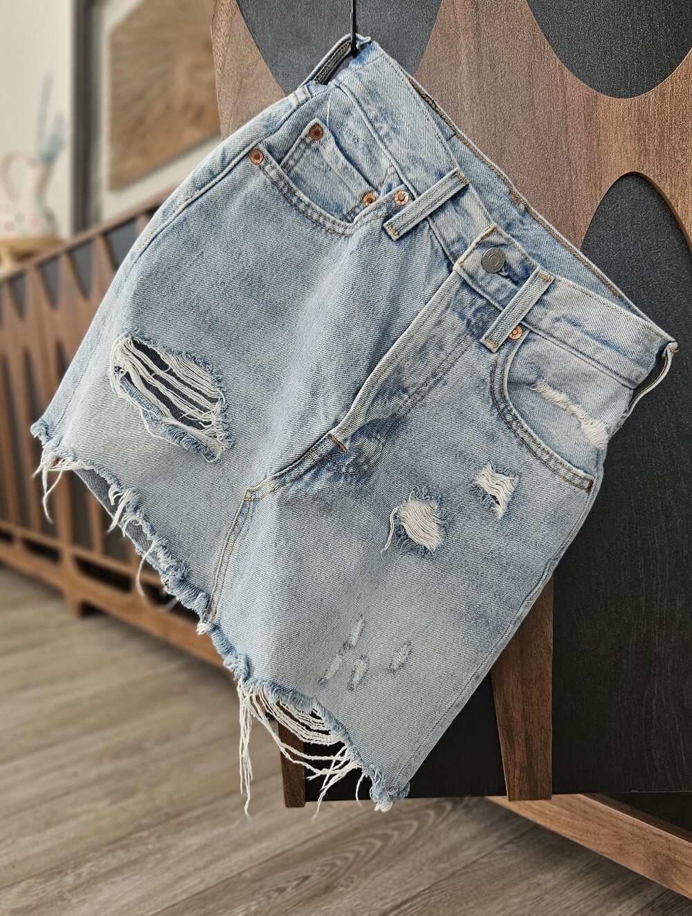 Light Wash Distressed Denim Mini Skirt